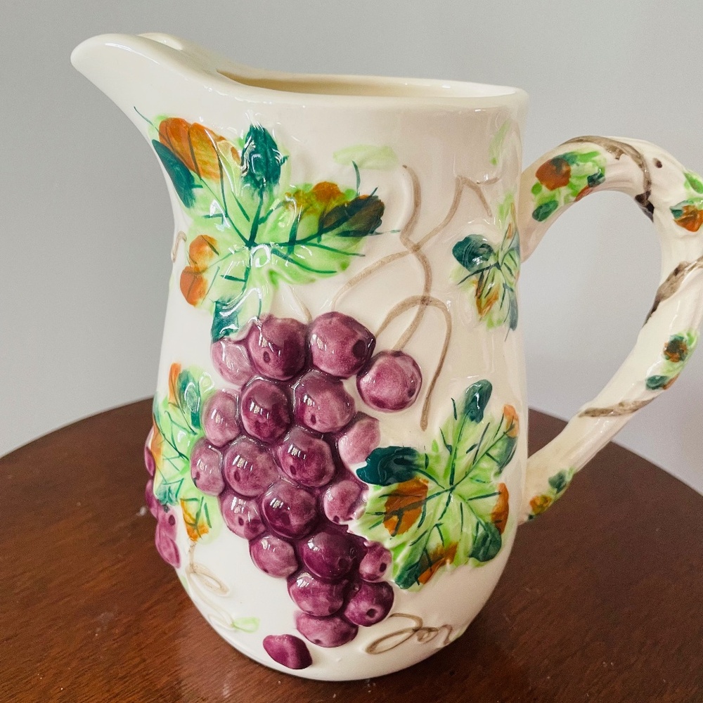 Vintage ceramic pitcher with raised purple grapes and green leaves, Pitcher